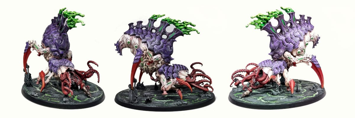 three images of a Tyranid Psychophage  painted in traditional Hivefleet Leviathan colours of purple, white and red