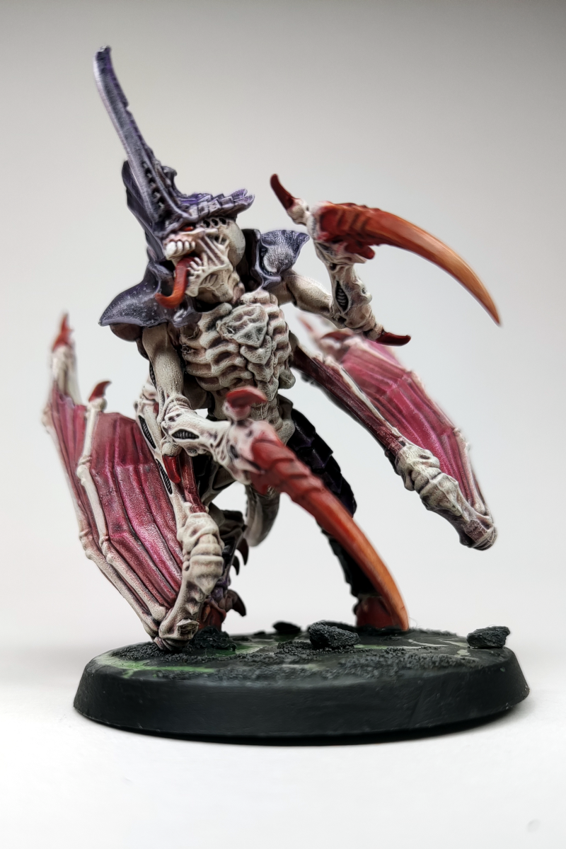 a Tyranid Winged Tyrant painted in traditional Hivefleet Leviathan colours of purple, white and red